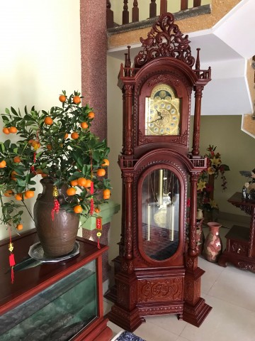 Đồng hồ cây Tứ trụ gỗ hương vân